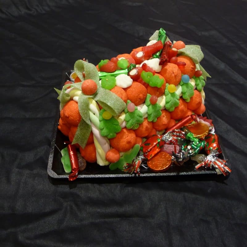 Gâteau de bonbons en forme de Bûche de Noël